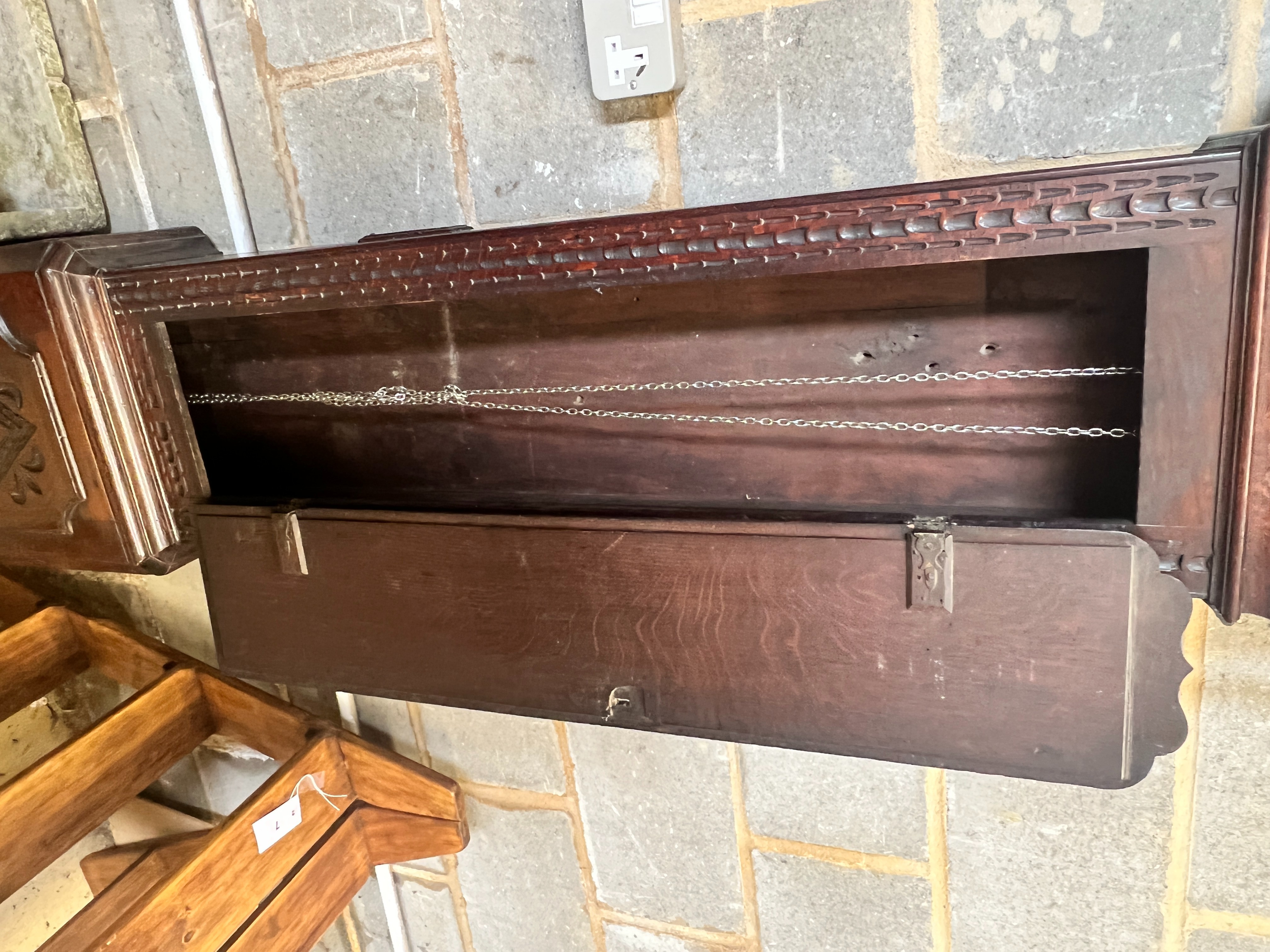 A George III later carved oak cased 30 hour longcase clock, marked Evans, Salop, height 234cm